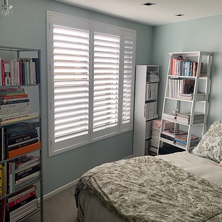 Basswood shutters…Adding elegance in this corner shaped room.