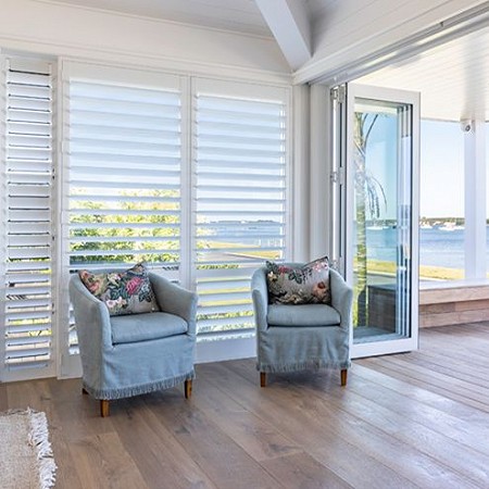 Lounge Solid Timber Basswood Shutters by Betta Blinds