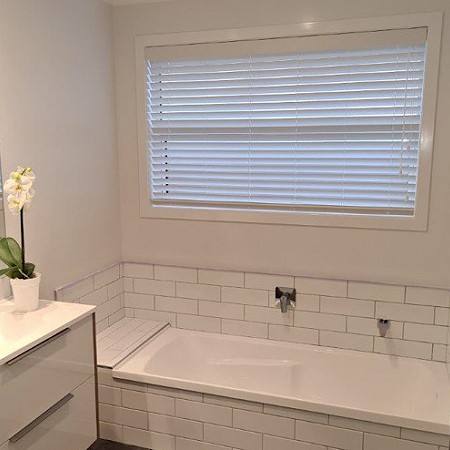 White Venetian blinds bathroom